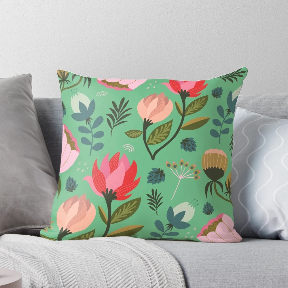 Vibrant, floral-patterned decorative pillow with botanical design