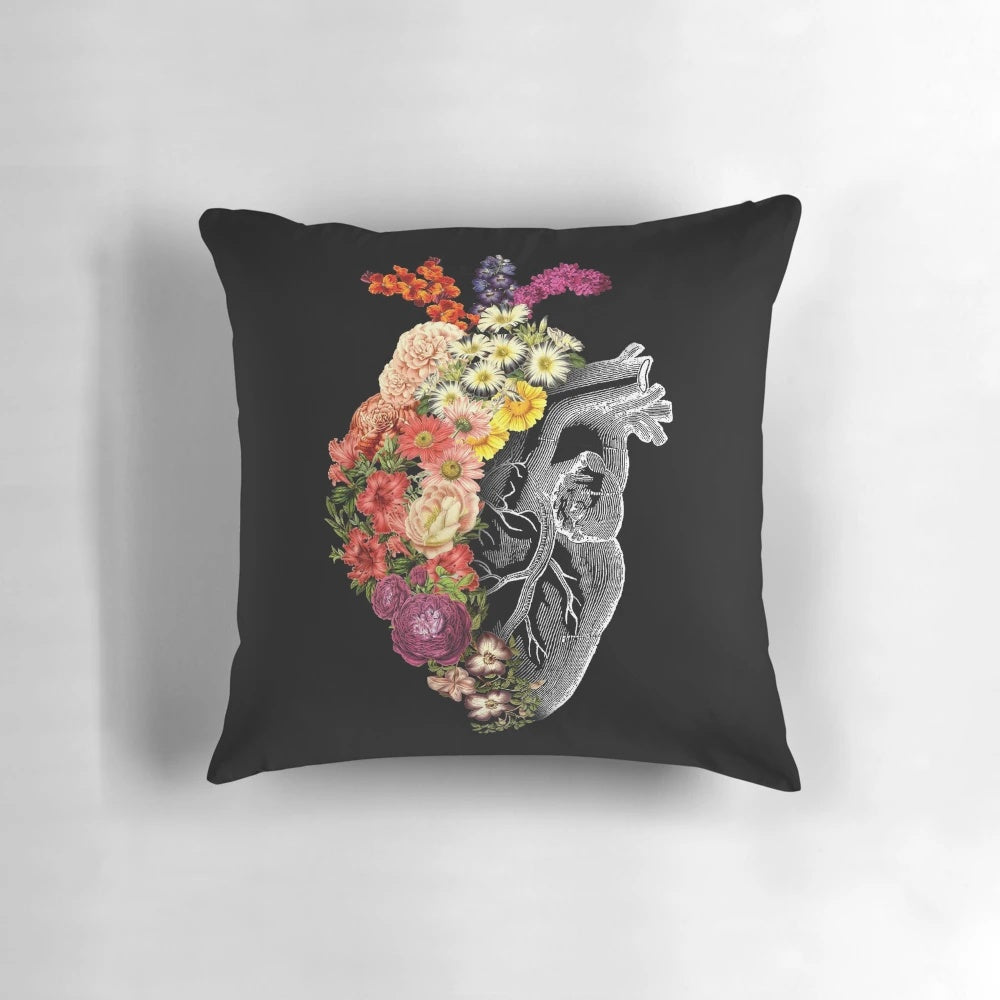 Vintage black and white floral heart design pillow featuring peonies, roses, violets, and dandelions