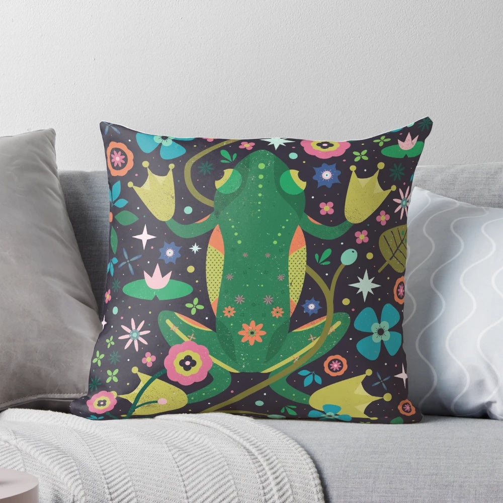 Colorful botanical frog-themed decorative throw pillow with leaves, flowers, and lily pads