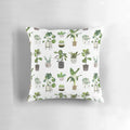 Decorative pillow featuring a botanical pattern of houseplants, succulents, and monstera leaves.