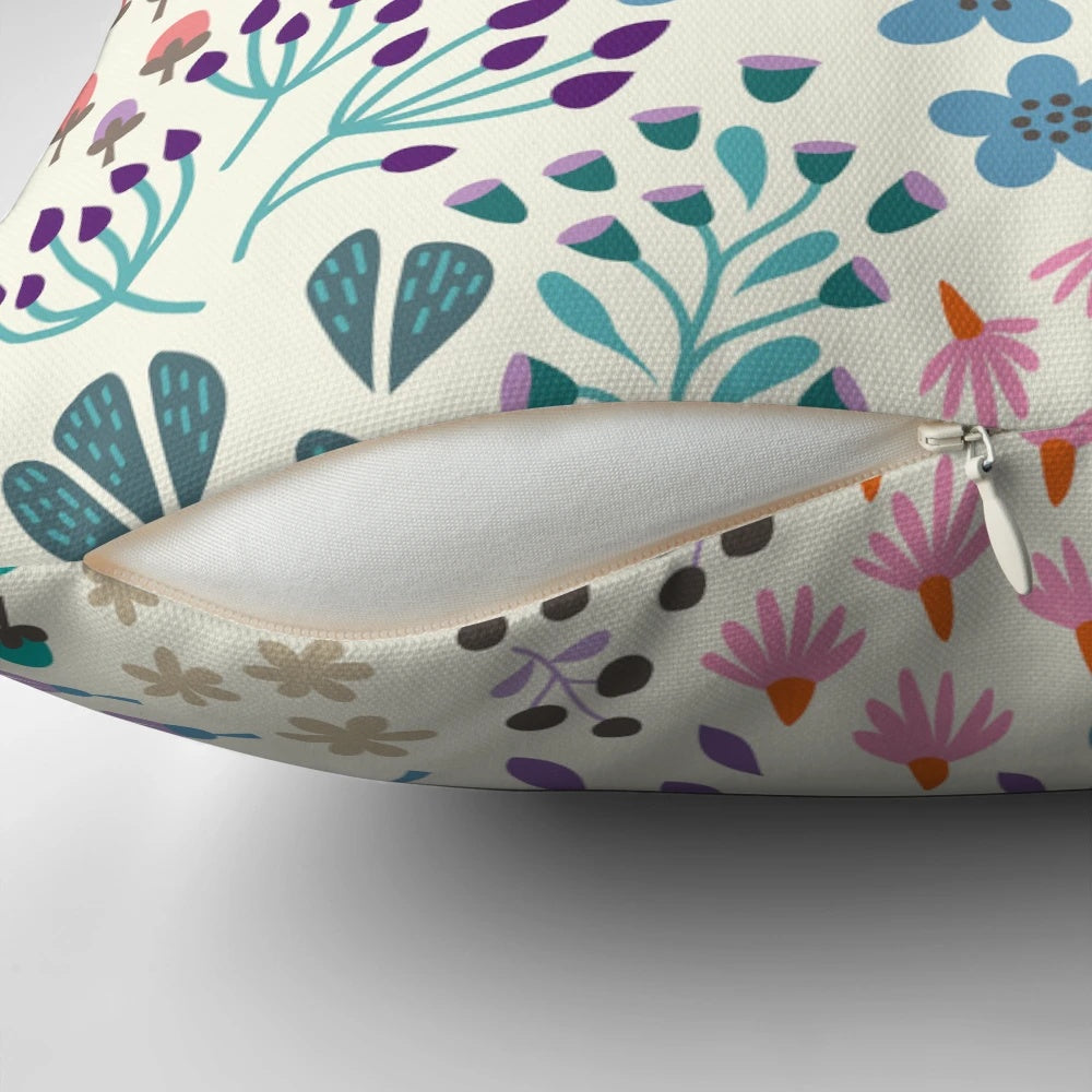 A decorative pillow featuring a botanical love letters design, perfect for autumn home decor.