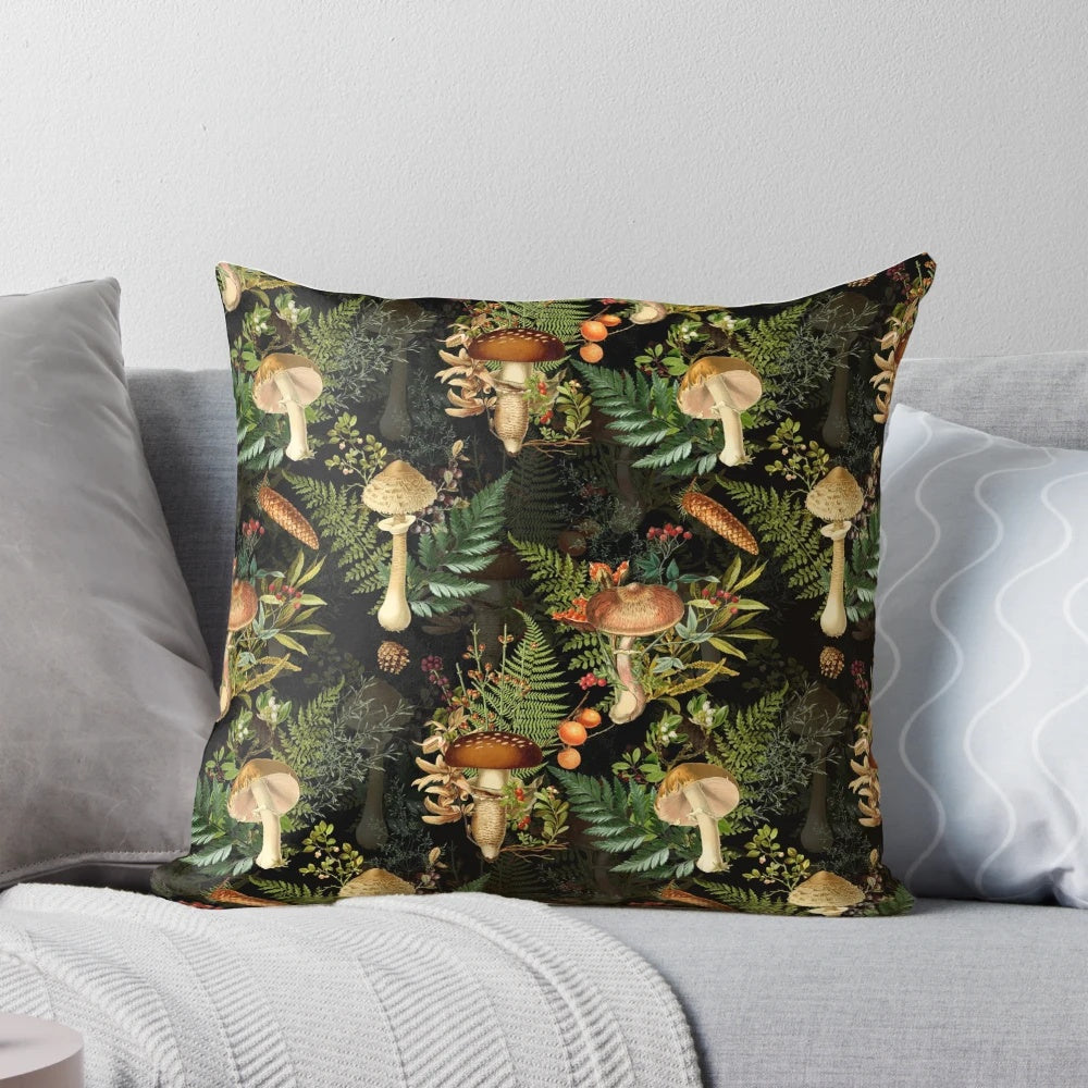 Vintage-inspired pillow featuring a botanical pattern with dark mushrooms and plants in a midnight forest scene