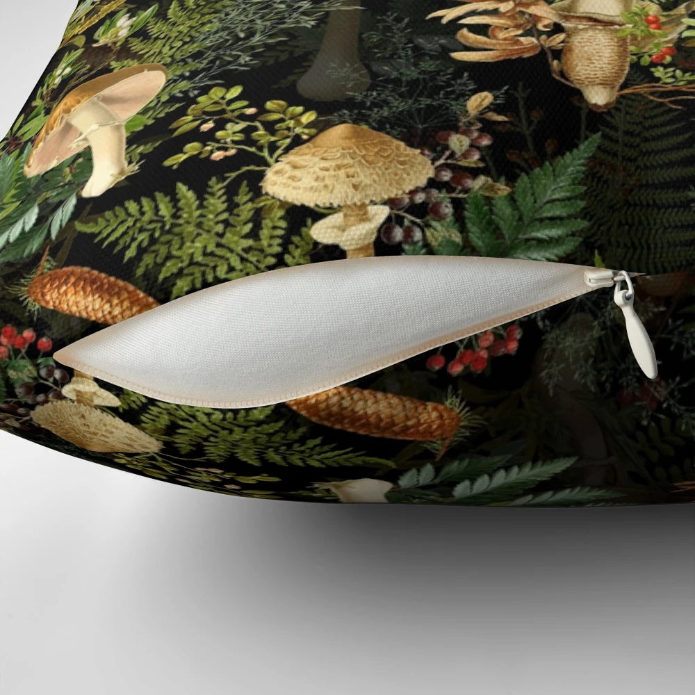 Vintage-inspired pillow featuring a botanical pattern with dark mushrooms and plants in a midnight forest scene