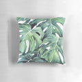 Decorative monstera plant pillow with abstract tropical leaf illustration