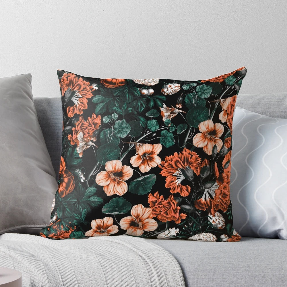 Lush botanical night forest pattern on a throw pillow with a vintage, rustic aesthetic.