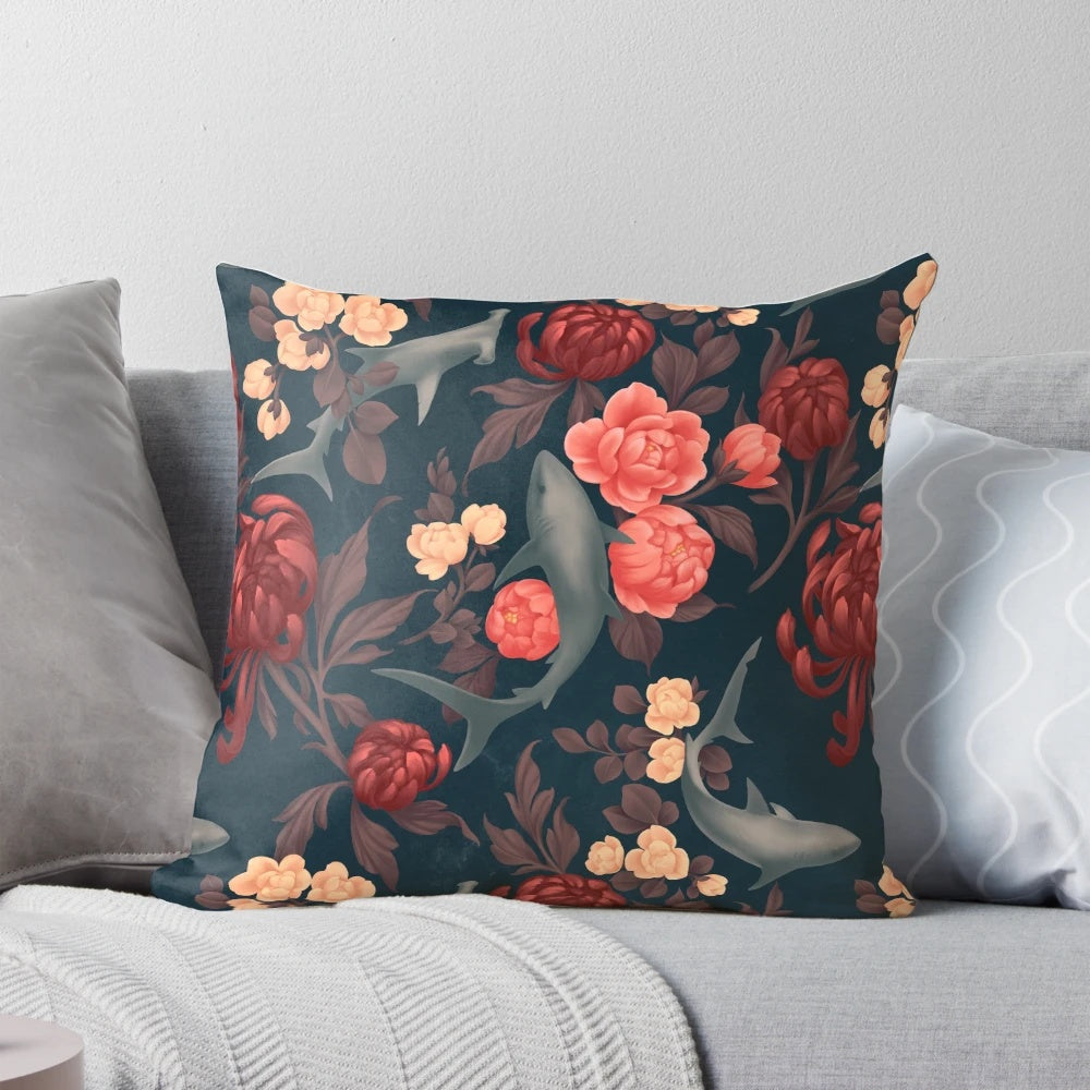 Botanical shark-themed pillow with red, blue, and turquoise floral accents.