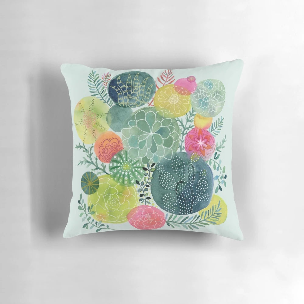 Handpainted botanical succulent circle pillow in shades of green and pink