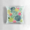 Handpainted botanical succulent circle pillow in shades of green and pink