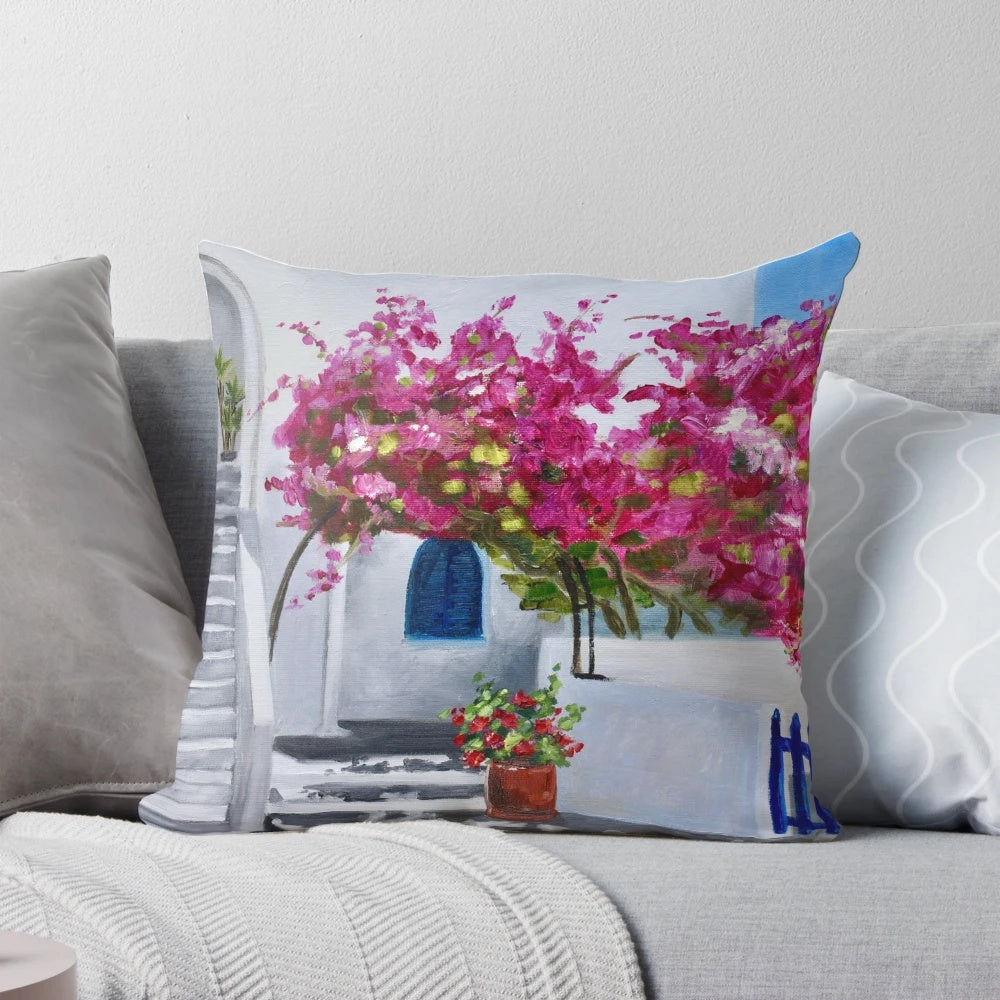 Bougainvillea Bloom Pillow with Vibrant Purple and Pink Flowers Against a Scenic Greek Island Background