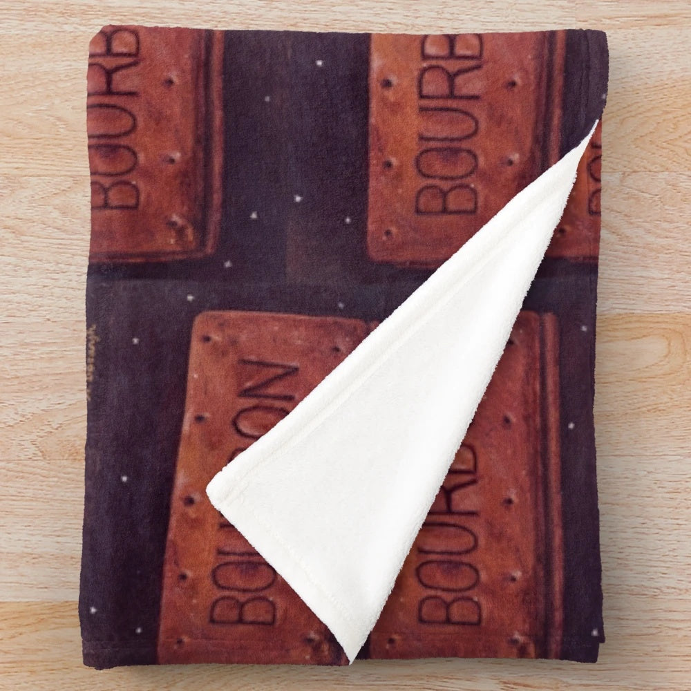 Bourbon biscuit plush blanket in a decorative oil paint effect design