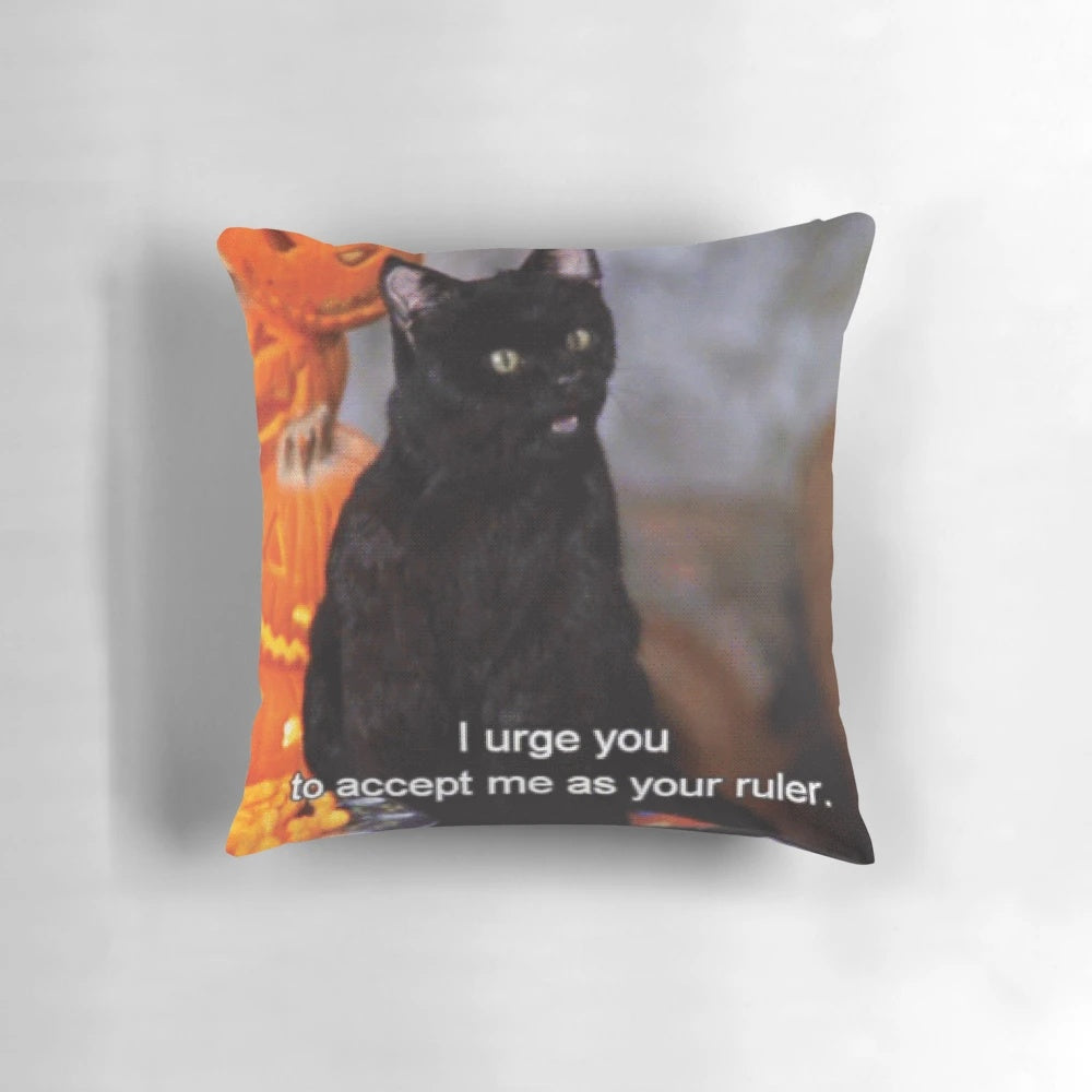 A decorative pillow featuring a bow and the character Salem from the "Sabrina the Teenage Witch" TV series.