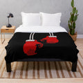 A cozy plush blanket featuring boxing gloves design for boxing enthusiasts