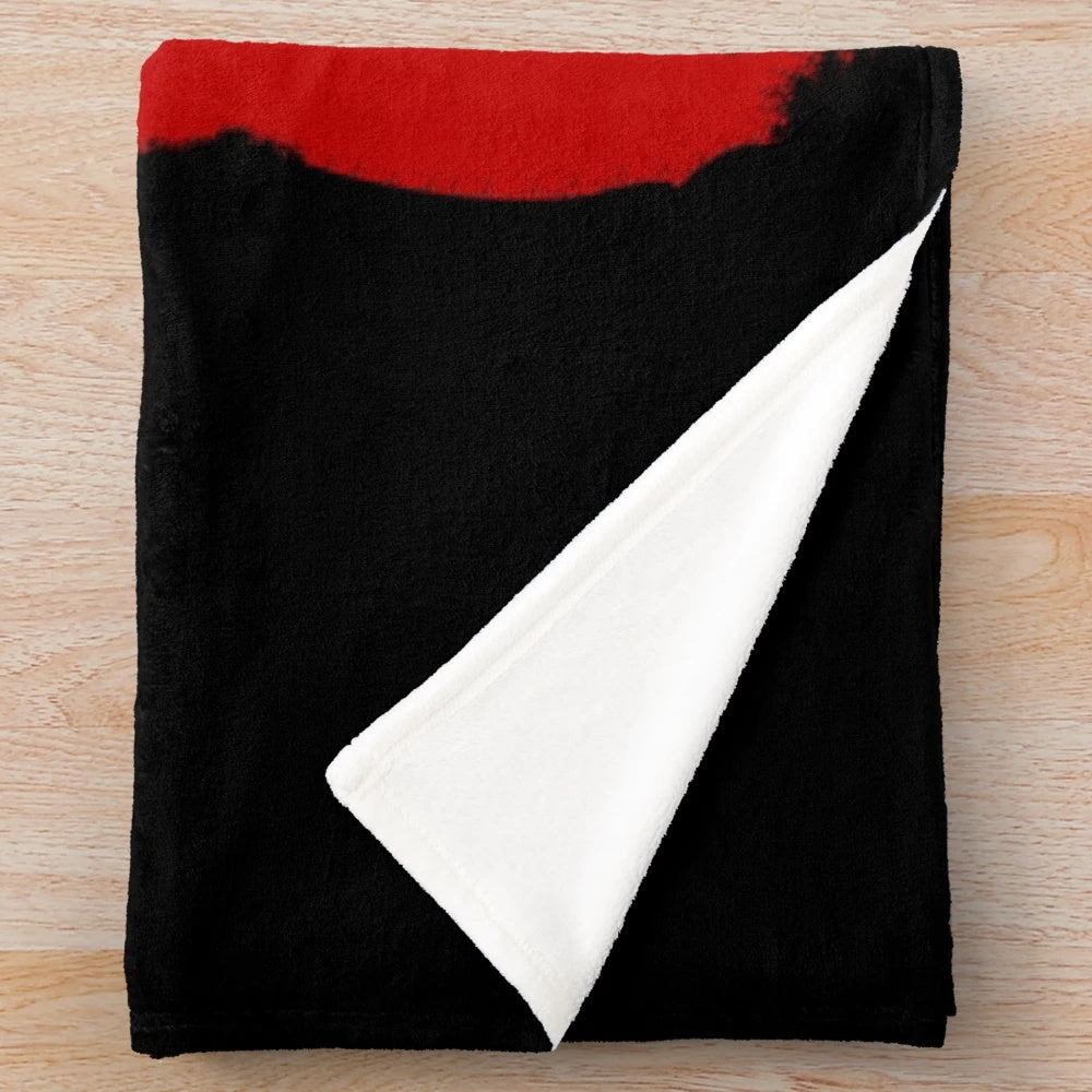 A cozy plush blanket featuring boxing gloves design for boxing enthusiasts