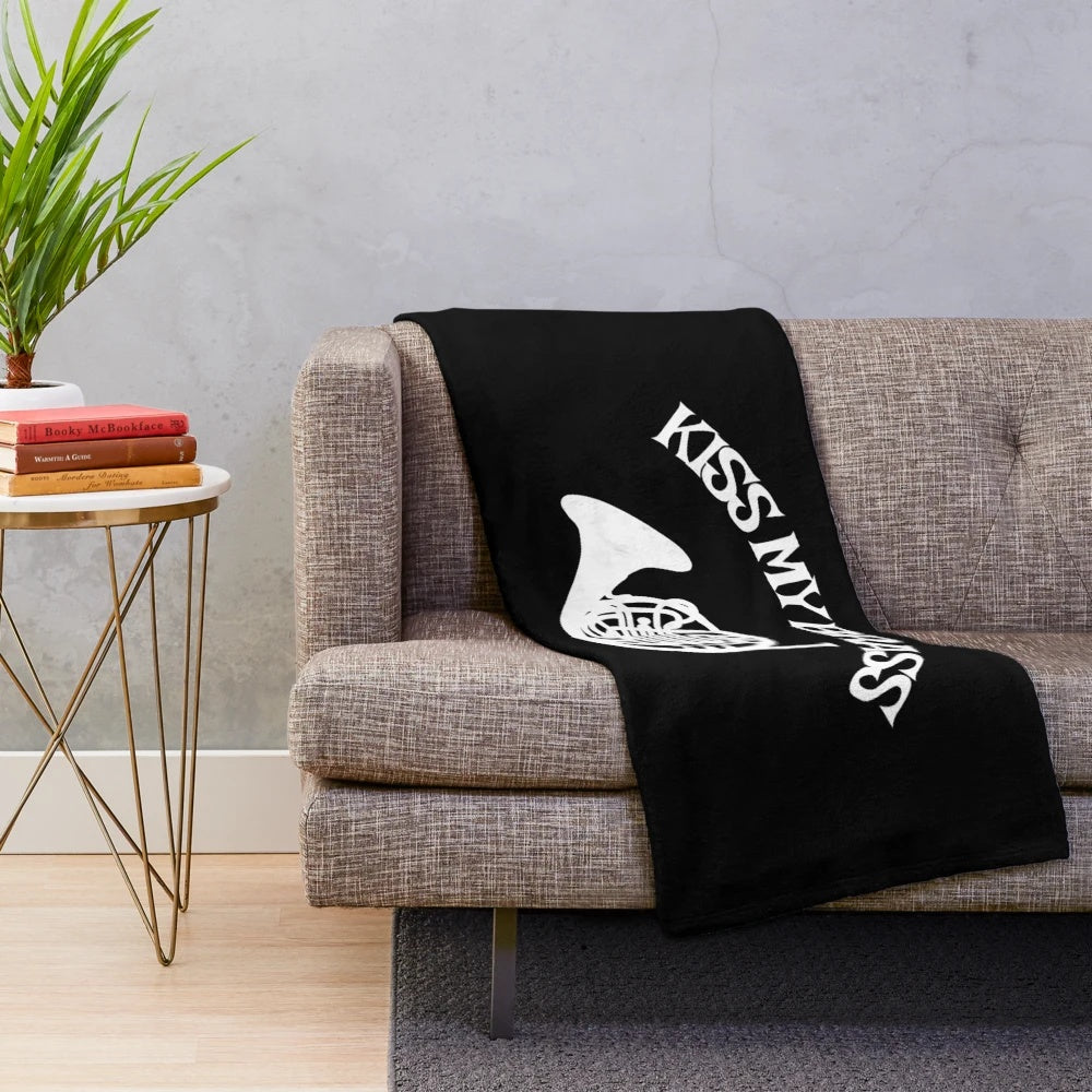 Plush blanket with a french horn design for music lovers