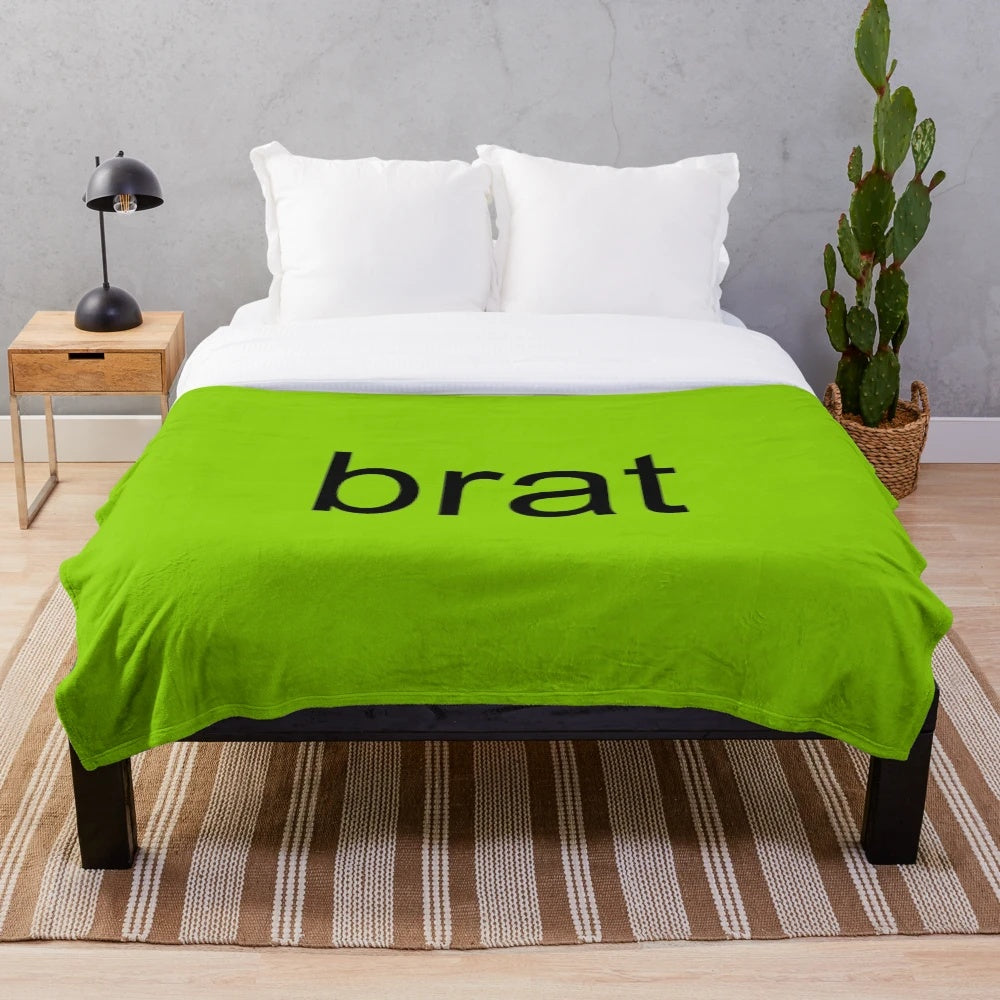 Soft and cozy brat-inspired plush blanket for music enthusiasts