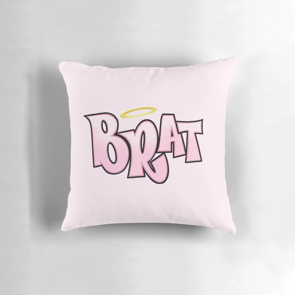 Bratz-inspired pink and magenta pillow with a sarcastic, angel-halo logo design for a cute, aesthetic bedroom.