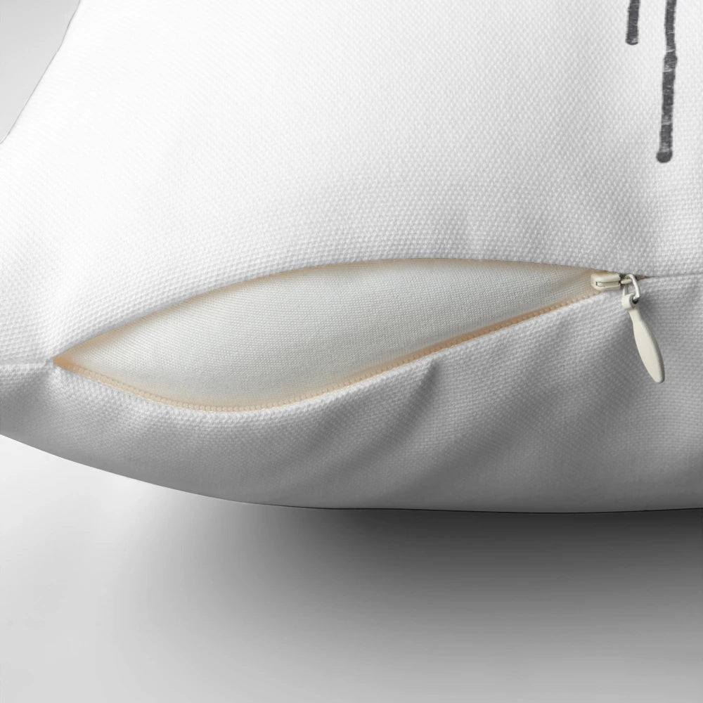 A soft, breathable pillow with a triangle and bird design, creating a calming and serene atmosphere for restful sleep.