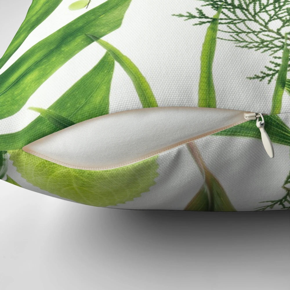 Closeup of a lush, translucent green foliage pillow with a botanical, nature-inspired design.