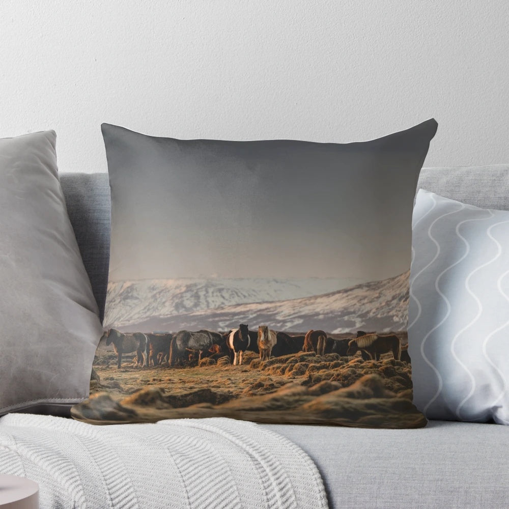 Stunning pillow featuring a picturesque scene of an Icelandic horse herd in a scenic mountain landscape at sunset.