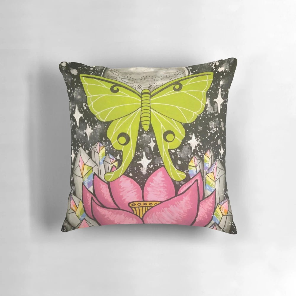 Stunning lunar moth art pillow featuring a detailed crystal-like moth design on a dark background.