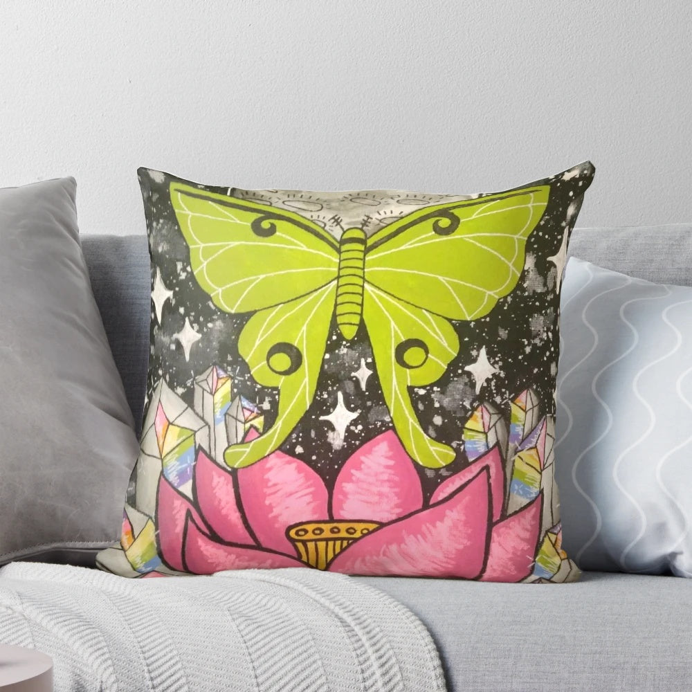 Stunning lunar moth art pillow featuring a detailed crystal-like moth design on a dark background.