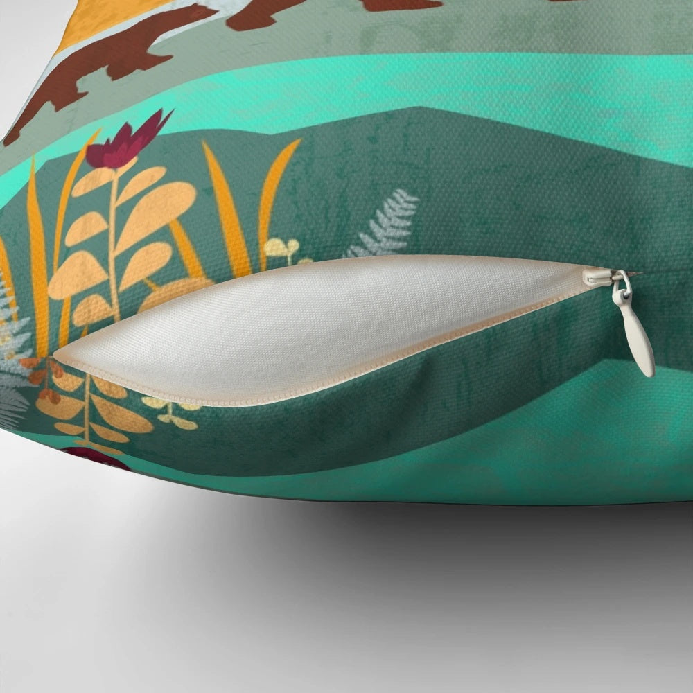 A vibrant, nature-inspired pillow featuring a mother bear and her cub in a scenic mountain landscape.
