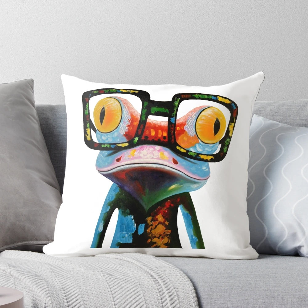 Colorful pillow featuring a whimsical hipster frog wearing nerd glasses, sitting on a tree branch.
