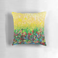 Vibrant and abstract pillow featuring a nature-inspired wildflower field landscape design.