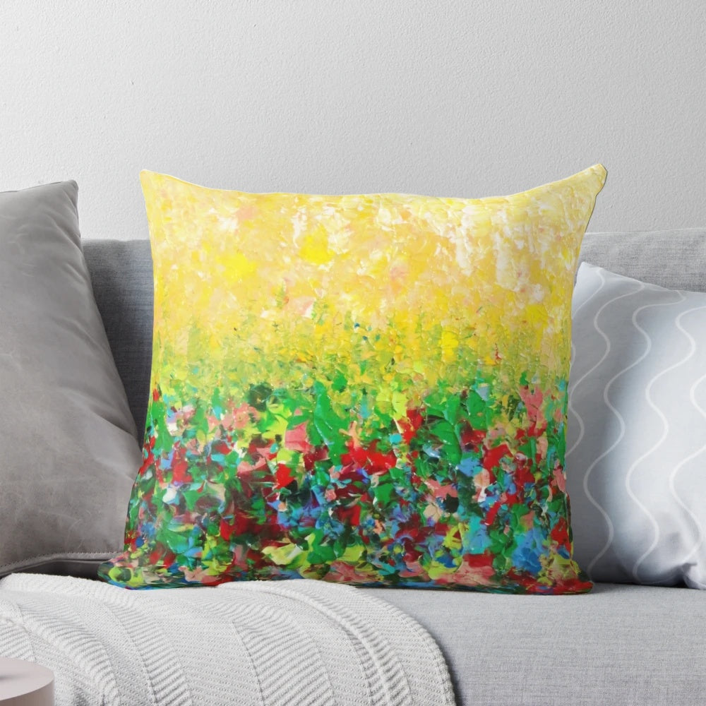 Vibrant and abstract pillow featuring a nature-inspired wildflower field landscape design.