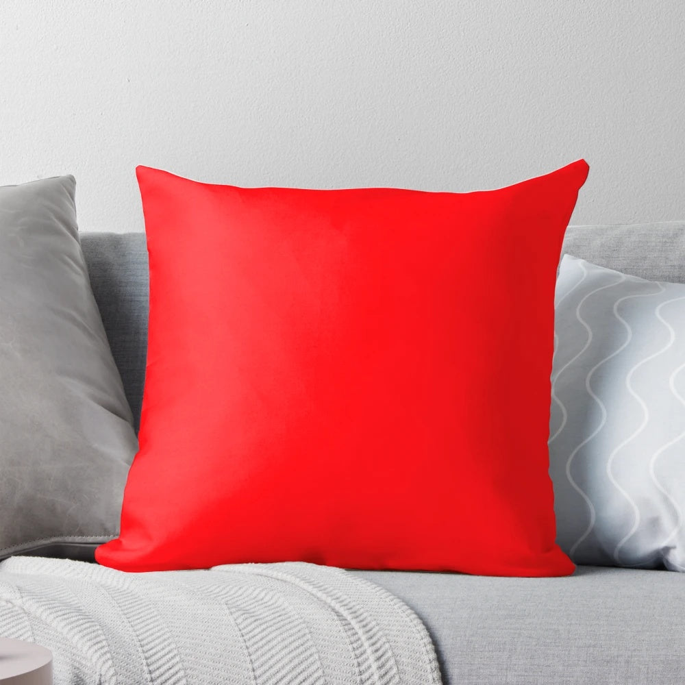 Bright fluorescent neon red pillow with a vibrant, vivid lighting effect