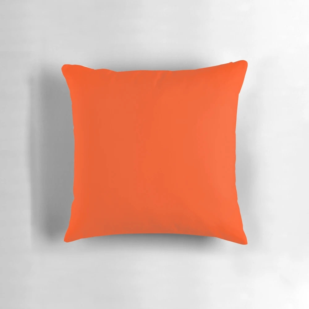 Bright fluorescent orange neon throw pillow with a bold and vibrant design, perfect for modern home decor.