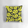 Bright yellow melted smiley face pillow