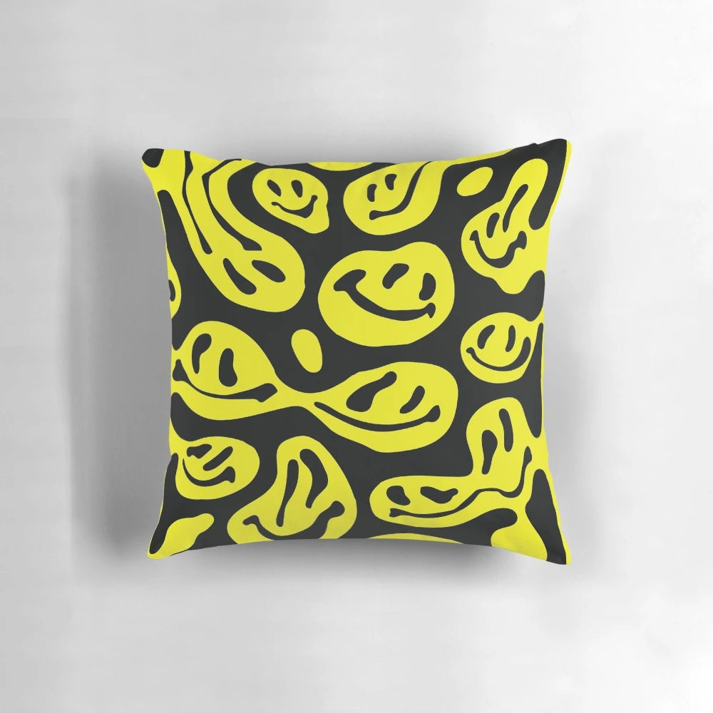 Bright yellow melted smiley face pillow
