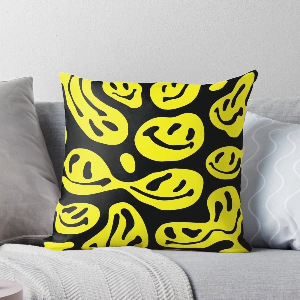 Bright yellow melted smiley face pillow