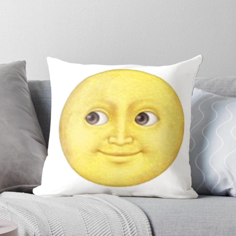 Soft and plush yellow moon face emoji pillow, perfect for home decor and adding a whimsical touch.