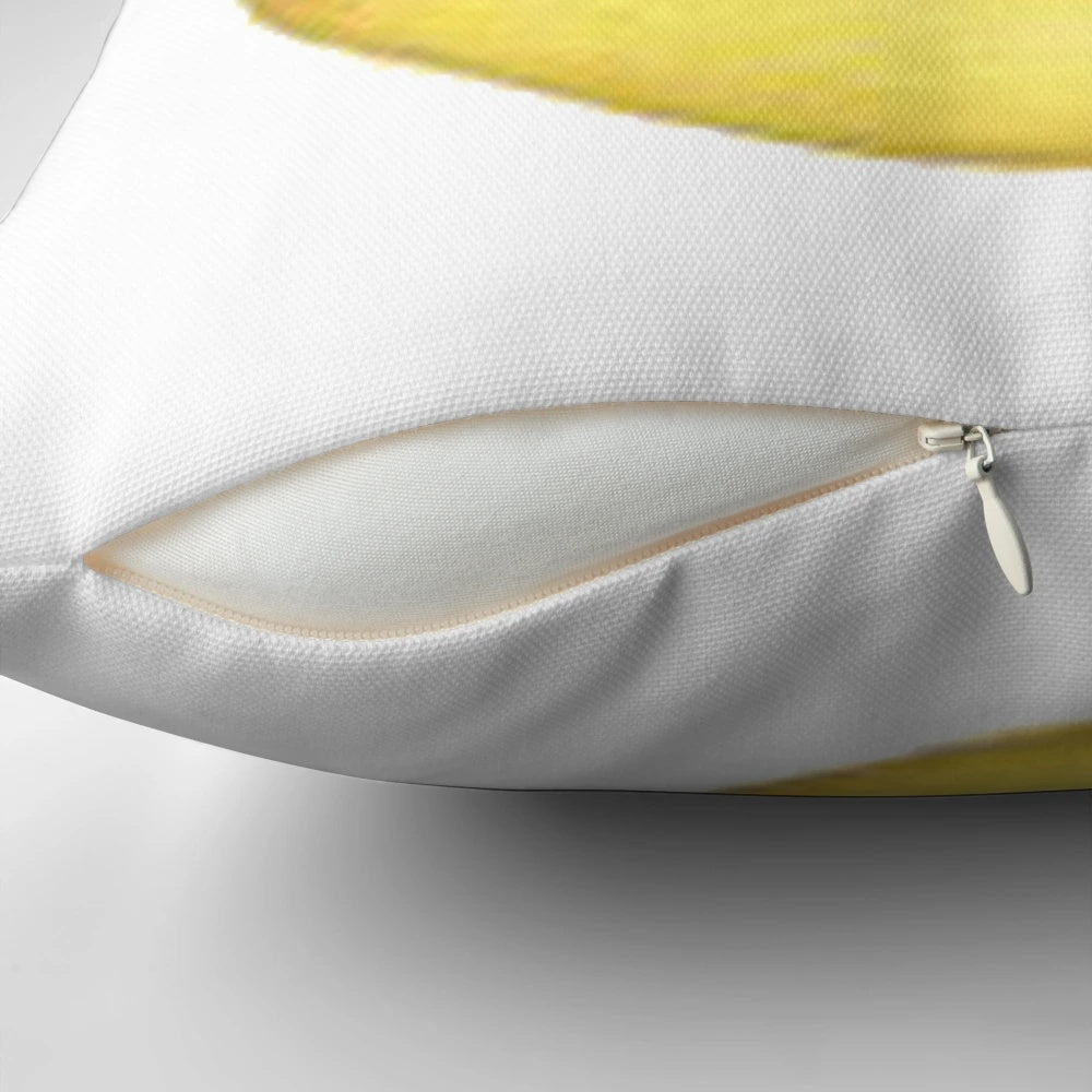 Soft and plush yellow moon face emoji pillow, perfect for home decor and adding a whimsical touch.