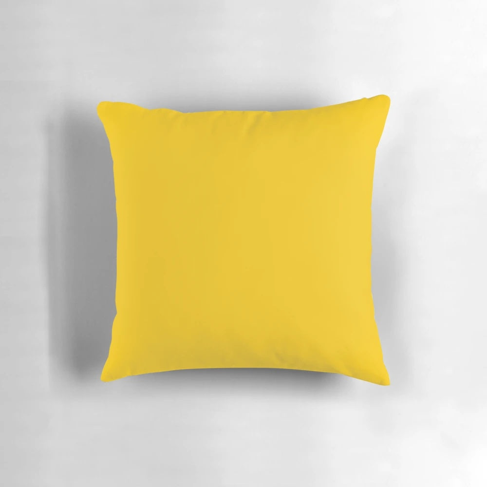 Bright yellow solid pillow with sunny, vibrant design