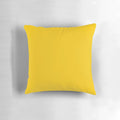 Bright yellow solid pillow with sunny, vibrant design