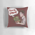 A cozy and decorative pillow featuring the famous carnivorous plant Audrey II from the musical "Little Shop of Horrors