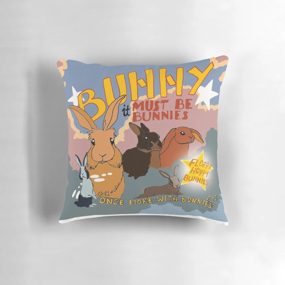 A cozy, decorative pillow featuring bunnies and the "Once More with Feeling" theme from Buffy the Vampire Slayer.