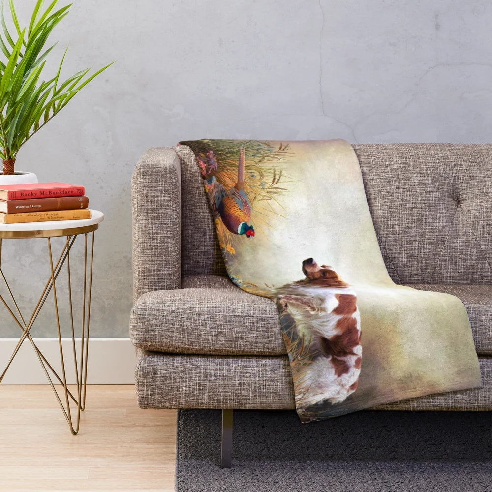 Brittany Spaniel hunting pheasant in scenic artwork on a plush blanket