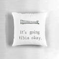 An image of a pillow with a graphic of a tibia bone and the text "It's Going Tibia Okay".