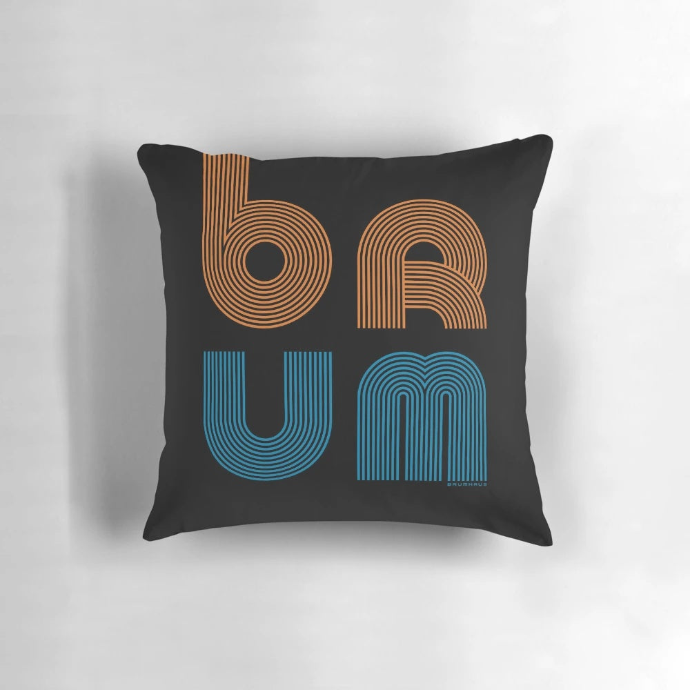 Brum 68 Pillow, a black and white geometric cushion featuring a modern, minimalist design inspired by the city of Birmingham.