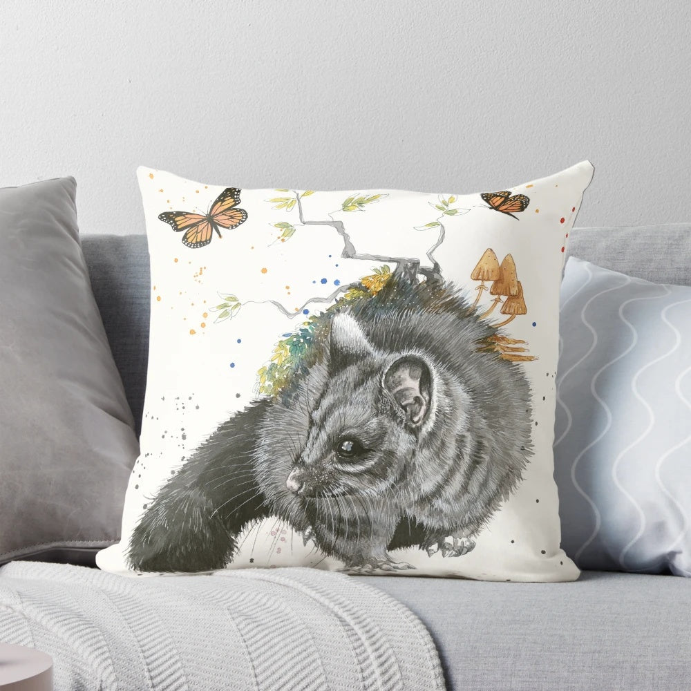 Vibrant brush-tailed possum pillow design featuring black, grey, and orange accents inspired by the Australian native animal