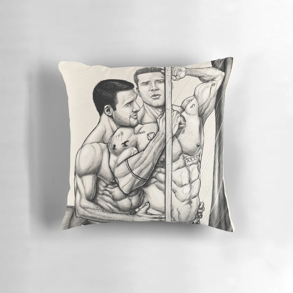 A soft, plush pillow featuring a romantic embrace between the characters Buddie, with their muscular physiques and tattoos on display.
