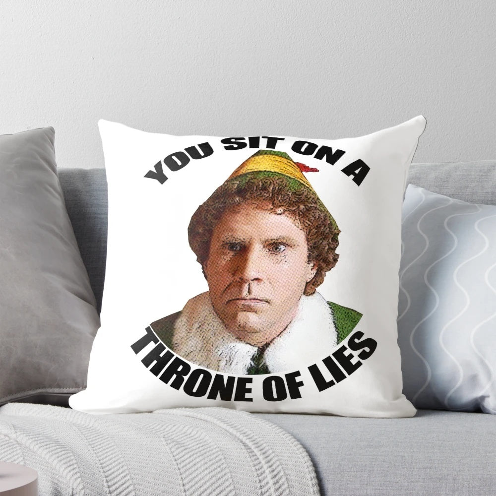 A cozy holiday pillow featuring the iconic "You Sit on a Throne of Lies" quote from the movie "Elf" starring Will Ferrell.