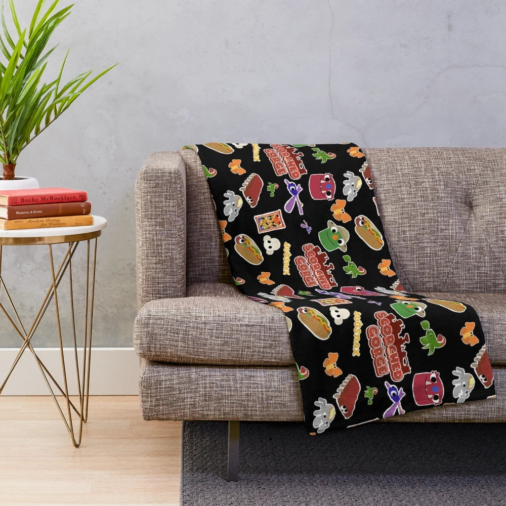 Bugsnax inspired Scorched Gorge plush blanket featuring characters like Bunger, Strabby, and Grumpus