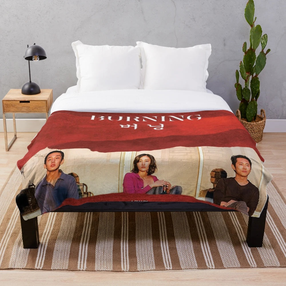 Cozy plush blanket featuring a burning movie poster design for film enthusiasts