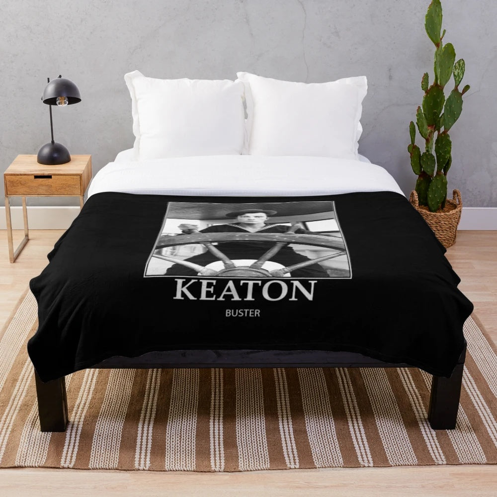 Buster Keaton in his iconic movie The Navigator, in black and white, on a plush blanket