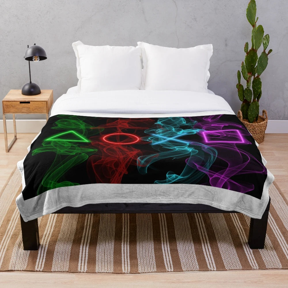 Plush blanket with controller buttons design